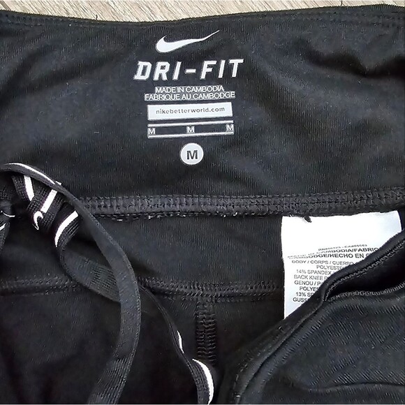 Nike dri fit leggings with ankle reflectors women's size medium - Picture 3 of 3